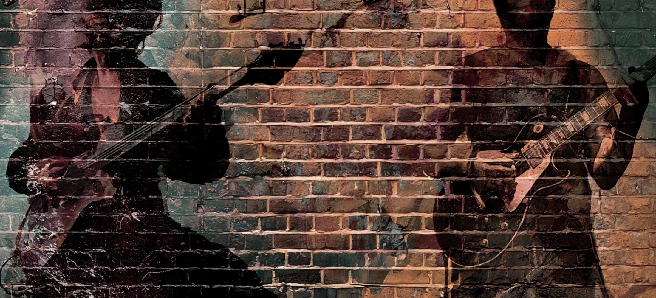 The wide shot behind the logo. Brick, a wall of guitars, a bench mid-session — something with room in the middle, because the mark sits over it.